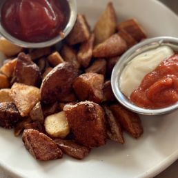 San Chez A Tapas Bistro signature dishes Patatas BravasPork BellyBistec Con Pimienta
